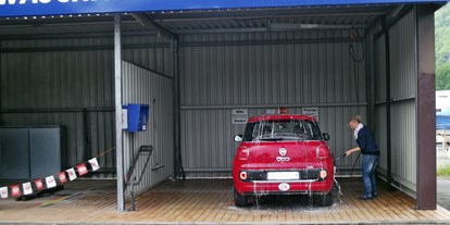 Wohnwagenhändler - Serviceinspektion - Aargau - Mit Waschboxe, gross genug für Wohnmobile mit 3.10 Metern Höhe - Vogel Wohnmobile