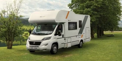 Wohnwagenhändler - Metzingen - Wohnmobil mieten - Alkoven Sun Living bei AlbCamper.de - AlbCamper Wohnmobilvermietung, Wohnmobil mieten