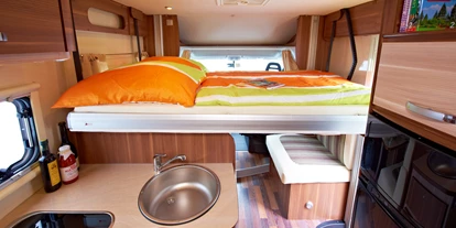 Caravandealer - Itter - alle Fahrzeuge sind mit Hubbett, die Sie mieten - bei Neuwagenbestellungen kann das kostenlose elektronische Hubbett auch abbestellt werten.  - Wohnmobile RASS