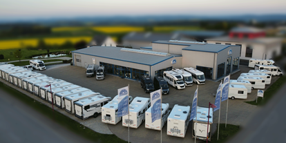 Wohnwagenhändler - Ausstellungshalle mit Werkstatt und Freigelände - AMB Reisemobile GmbH